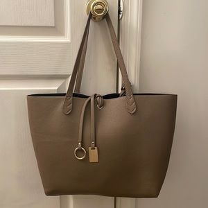 Medium sized, tan moderately used Tote